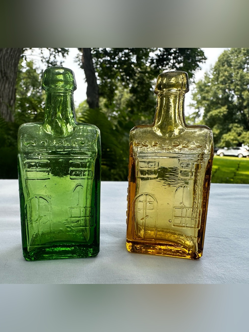 Vintage E.G.Booz's Old Cabin “mini” Whiskey Glass Bottles - Set of 2 Amber/Green